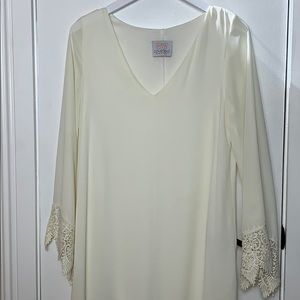 Coveted clothing cream colored dress size Sm.